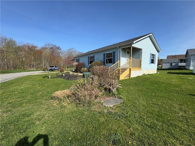 11 Cardinal Ct, Tiverton, RI 02878 - view of front of house featuring a front lawn