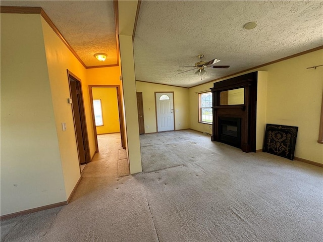 11 Cardinal Ct, Tiverton, RI 02878 - unfurnished living room with ornamental molding and a textured ceiling