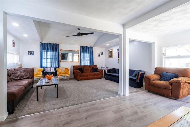 living area with ceiling fan, recessed lighting, and wood finished floors