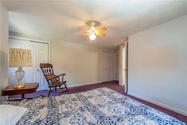 sitting room with a ceiling fan, baseboards, and dark carpet