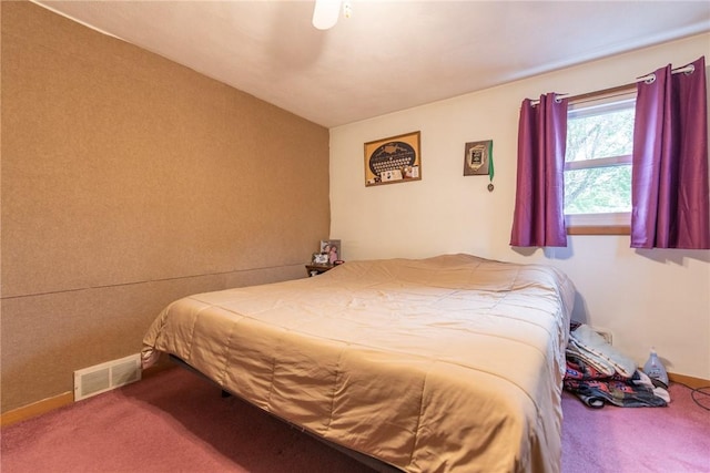 bedroom with carpet flooring and visible vents