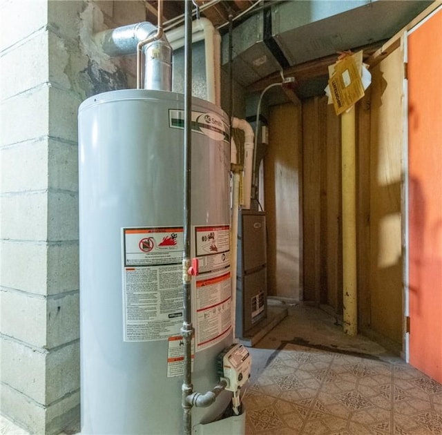 utility room featuring gas water heater