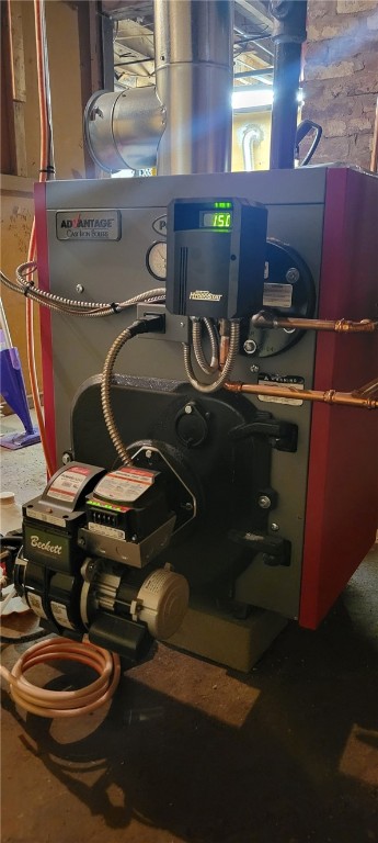 utility room with a heating unit
