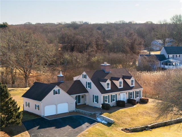 drone / aerial view with a view of trees