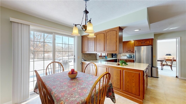 410 Wandsworth St, Narragansett, RI 02882 - dining area featuring a chandelier and a textured ceiling