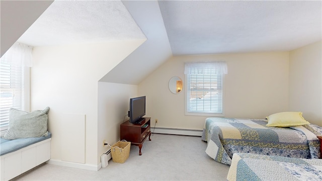 410 Wandsworth St, Narragansett, RI 02882 - bedroom featuring a baseboard heating unit, vaulted ceiling, and light colored carpet