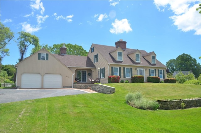 410 Wandsworth St, Narragansett, RI 02882 - new england style home featuring a front lawn, asphalt driveway, a chimney, and an attached garage