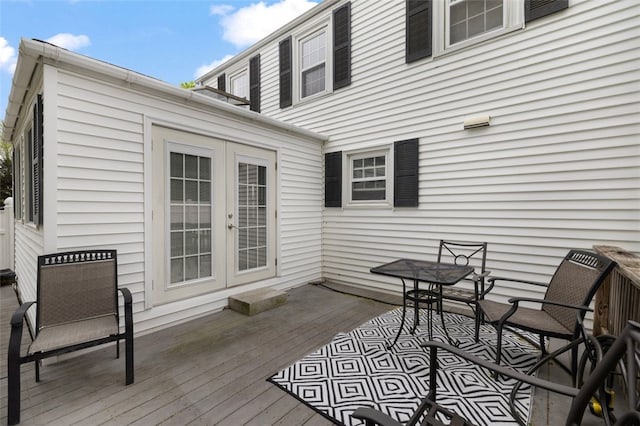 wooden terrace featuring french doors