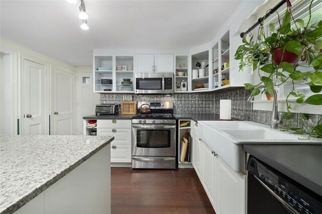 kitchen with tasteful backsplash, open shelves, white cabinets, dark wood-style floors, and stainless steel appliances