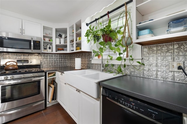 kitchen with decorative backsplash, open shelves, dark wood finished floors, white cabinets, and stainless steel appliances