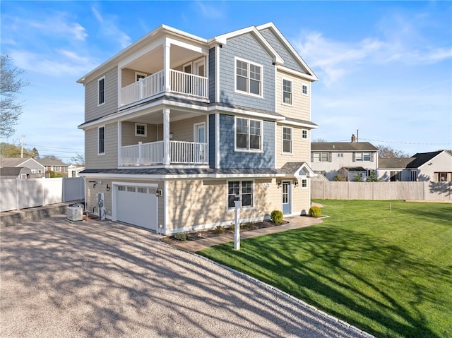 25 Scallop Shell Rd, Narragansett, RI 02882 - view of front of house with fence, a front lawn, aphalt driveway, cooling unit, and a balcony