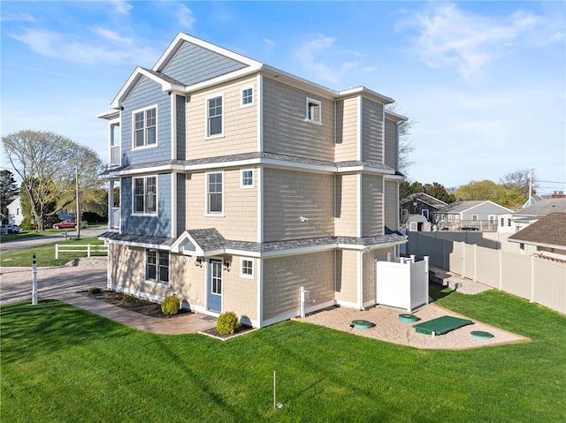 25 Scallop Shell Rd, Narragansett, RI 02882 - back of property featuring fence and a yard