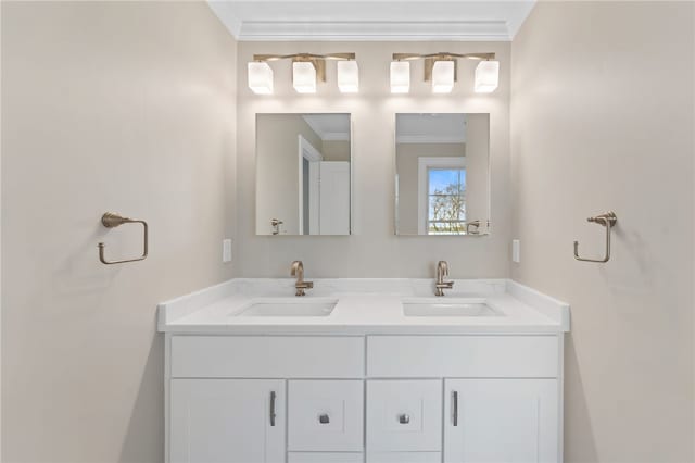 25 Scallop Shell Rd, Narragansett, RI 02882 - bathroom with crown molding, double vanity, and a sink