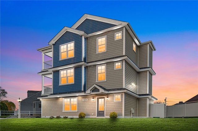25 Scallop Shell Rd, Narragansett, RI 02882 - view of front of property with a yard, a balcony, and fence