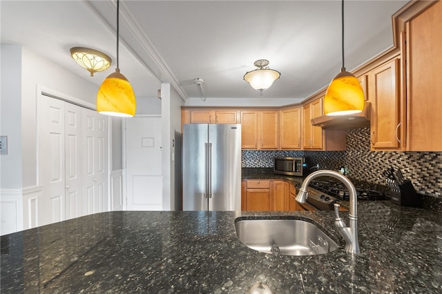 752 Quaker Ln Unit B108, Warwick, RI 02818 - kitchen with a sink, dark stone counters, stainless steel appliances, and decorative light fixtures