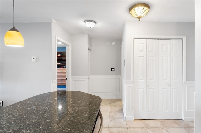 752 Quaker Ln Unit B108, Warwick, RI 02818 - interior space with a wainscoted wall and light tile patterned flooring