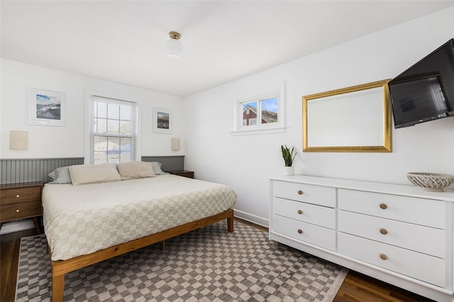bedroom featuring dark wood-type flooring