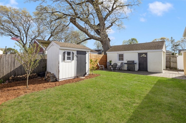 view of shed featuring a fenced backyard