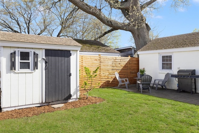 view of shed with fence