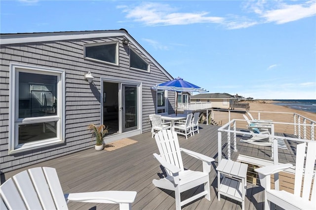 wooden deck with outdoor dining space
