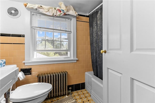 15 Broadmoor Rd, Cranston, RI 02910 - full bathroom with toilet, tile patterned floors, radiator heating unit, tile walls, and visible vents