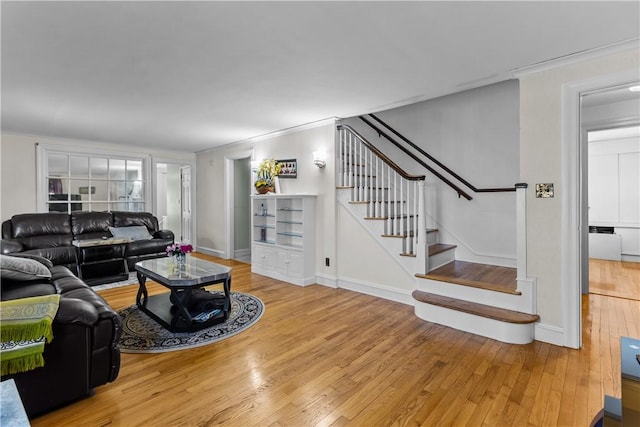 15 Broadmoor Rd, Cranston, RI 02910 - living area featuring stairs, crown molding, baseboards, and hardwood / wood-style floors