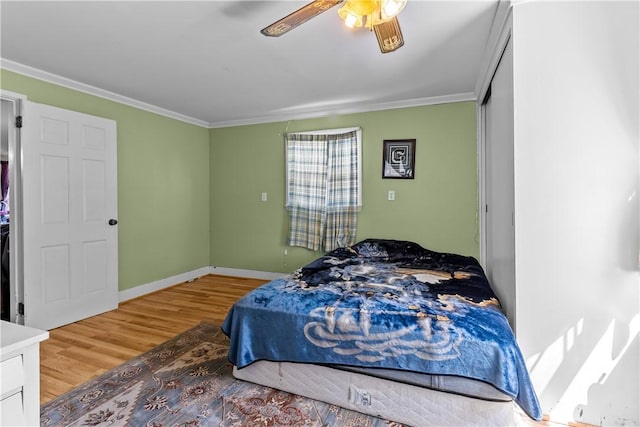 15 Broadmoor Rd, Cranston, RI 02910 - bedroom featuring crown molding, baseboards, ceiling fan, and wood finished floors