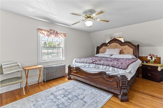 15 Broadmoor Rd, Cranston, RI 02910 - bedroom featuring radiator, a ceiling fan, and wood finished floors