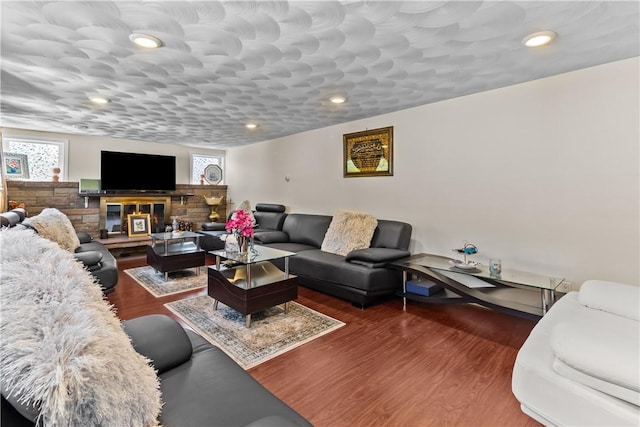 15 Broadmoor Rd, Cranston, RI 02910 - living area featuring recessed lighting, a stone fireplace, and wood finished floors