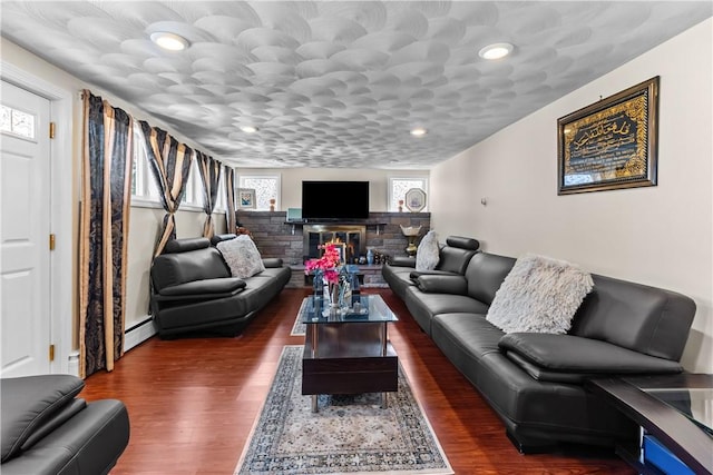 15 Broadmoor Rd, Cranston, RI 02910 - living room featuring baseboard heating, recessed lighting, and wood finished floors