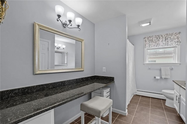 60 Hawthorne Pl Unit 23, North Providence, RI 02904 - full bath with tile patterned floors, a baseboard radiator, vanity, toilet, and a notable chandelier