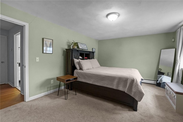 60 Hawthorne Pl Unit 23, North Providence, RI 02904 - bedroom with carpet floors, baseboards, and a baseboard heating unit