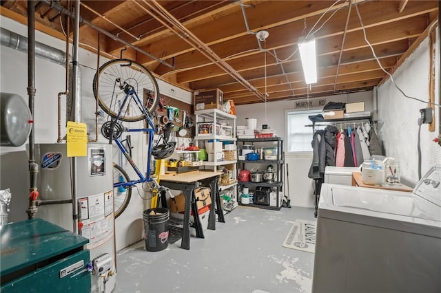 60 Hawthorne Pl Unit 23, North Providence, RI 02904 - below grade area with water heater, a workshop area, and washer and clothes dryer