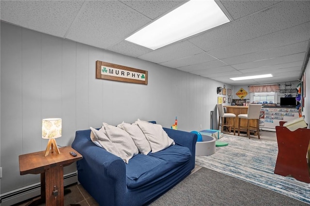 60 Hawthorne Pl Unit 23, North Providence, RI 02904 - carpeted living area featuring a drop ceiling and baseboard heating