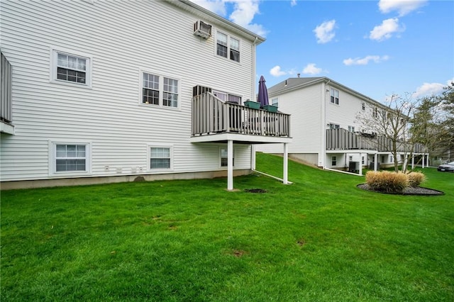 60 Hawthorne Pl Unit 23, North Providence, RI 02904 - back of property featuring a lawn, a deck, and an AC wall unit