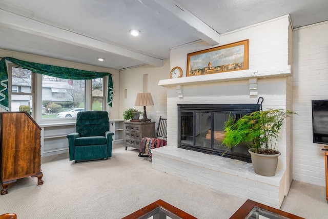 180 Birkshire Dr, Warwick, RI 02886 - carpeted living room featuring a glass covered fireplace and beamed ceiling