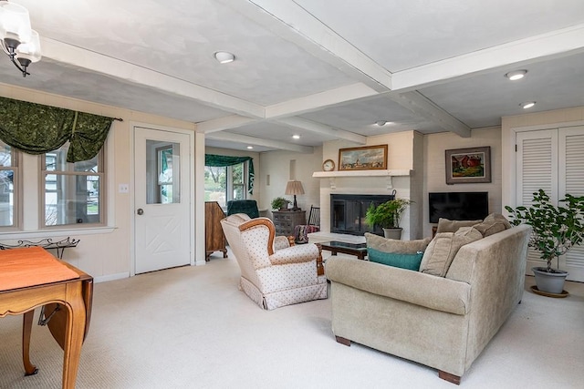 180 Birkshire Dr, Warwick, RI 02886 - living area with light colored carpet, baseboards, beamed ceiling, a glass covered fireplace, and recessed lighting