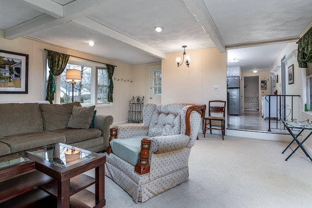 180 Birkshire Dr, Warwick, RI 02886 - living room featuring carpet floors, beamed ceiling, and a notable chandelier