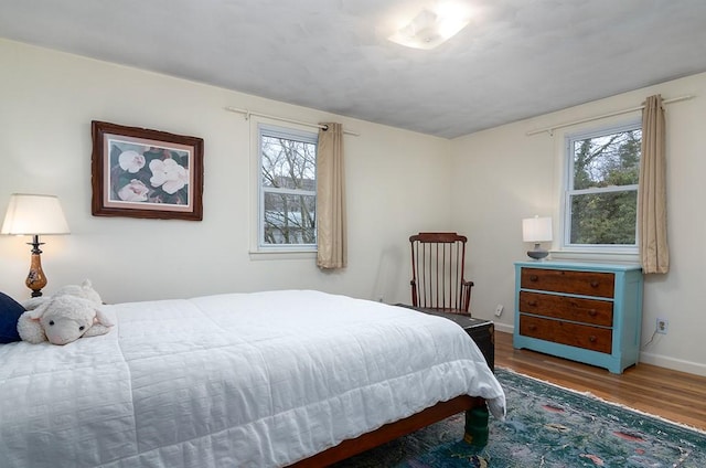 180 Birkshire Dr, Warwick, RI 02886 - bedroom with baseboards and wood finished floors