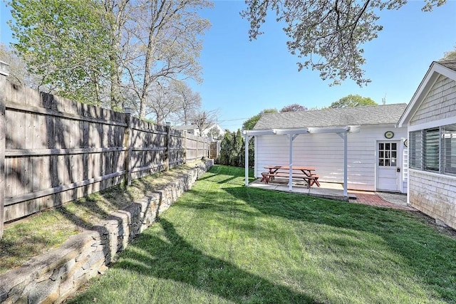 view of yard featuring a pergola, fence, and a patio area