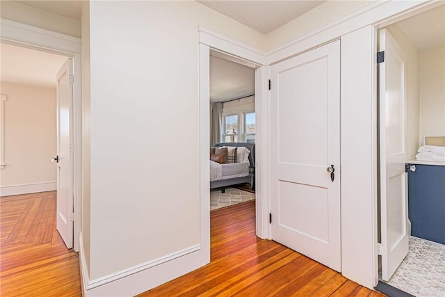 888 Providence St, West Warwick, RI 02893 - hallway with light wood finished floors