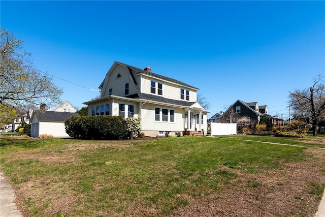 888 Providence St, West Warwick, RI 02893 - view of property exterior with a lawn, a chimney, and a gambrel roof