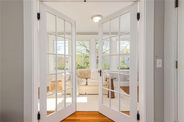 888 Providence St, West Warwick, RI 02893 - doorway to outside featuring light wood-type flooring
