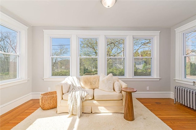888 Providence St, West Warwick, RI 02893 - sunroom / solarium featuring radiator heating unit and a wealth of natural light