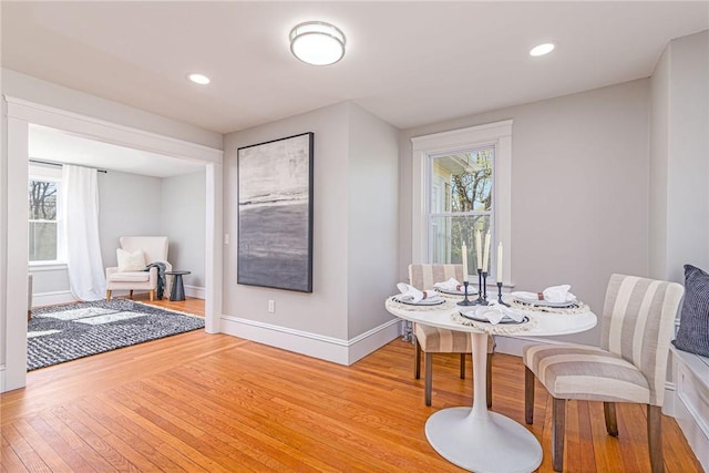 888 Providence St, West Warwick, RI 02893 - dining area with plenty of natural light, recessed lighting, light wood-style flooring, and baseboards