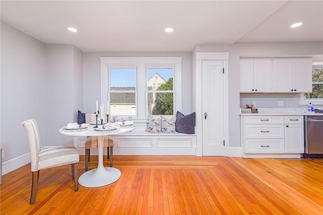 888 Providence St, West Warwick, RI 02893 - dining room with recessed lighting, a wealth of natural light, and light wood finished floors