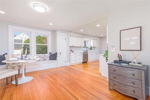 888 Providence St, West Warwick, RI 02893 - interior space with a healthy amount of sunlight and light wood-style floors