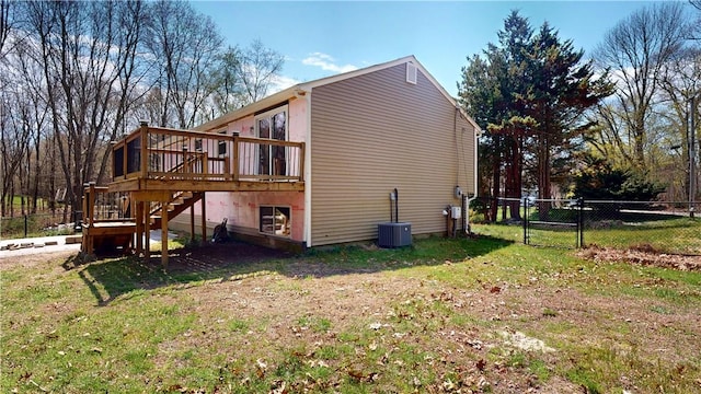 108 Shady Lea Rd, North Kingstown, RI 02852 - view of property exterior featuring stairs, a wooden deck, a yard, and fence