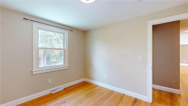 108 Shady Lea Rd, North Kingstown, RI 02852 - spare room featuring visible vents, light wood finished floors, and baseboards
