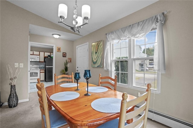 dining space with vaulted ceiling, a baseboard radiator, light colored carpet, and a notable chandelier